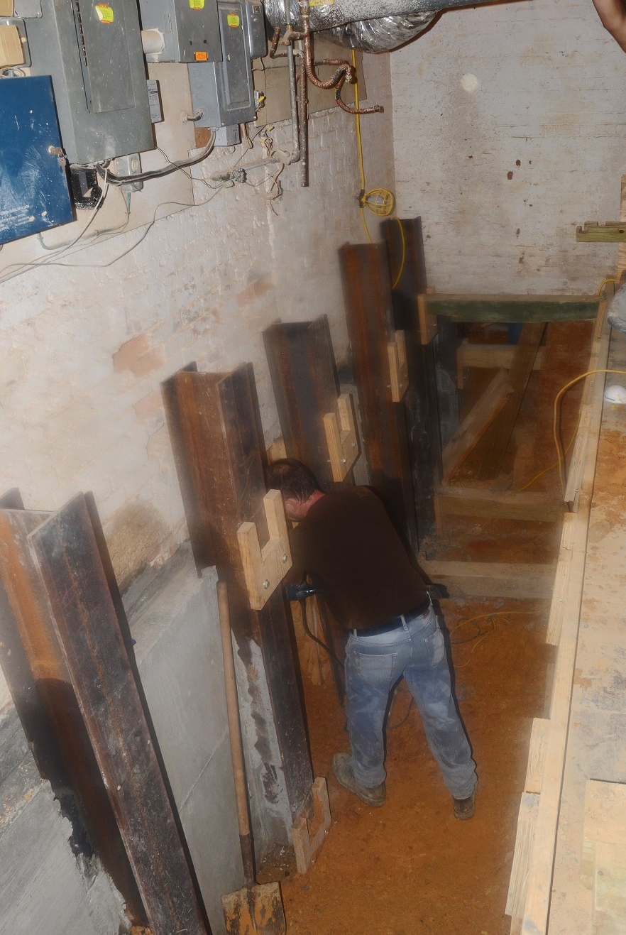 Excavated basement and foundation underpinning components. 