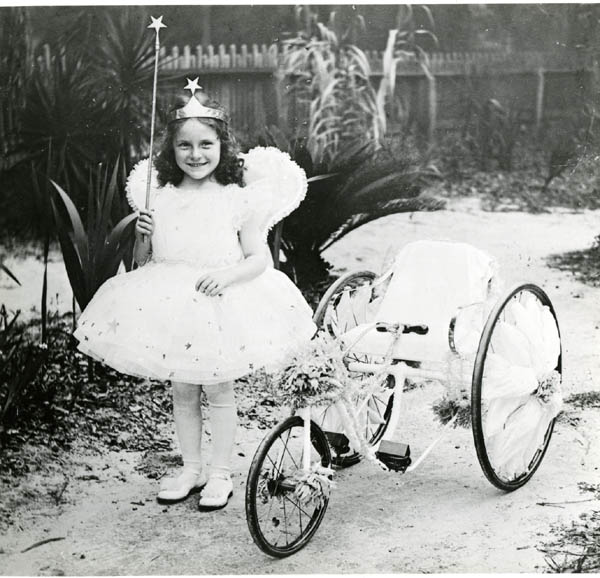 Mary Call Darby at the Brevard family house as the "Queen of the Fairies" for the May Day celebration, ca. 1917.